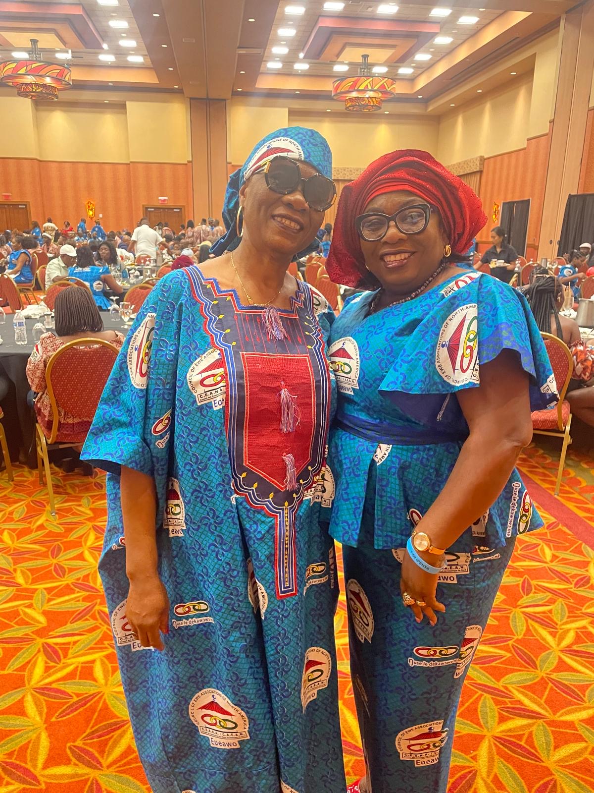 Two CEANA 2024 guests wearing coordinated blue convention attire