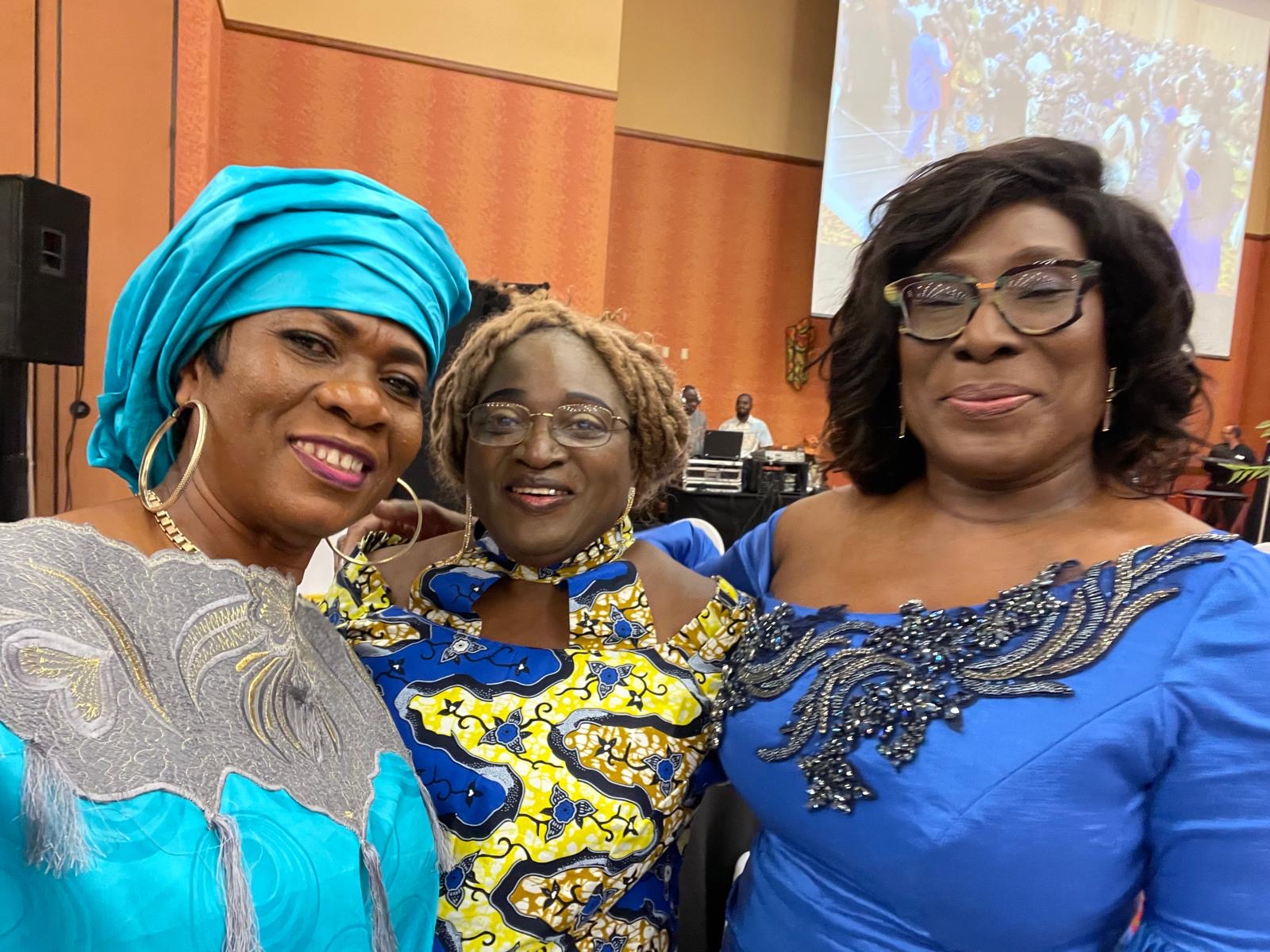 Three guests smiling together at the CEANA 2024 convention