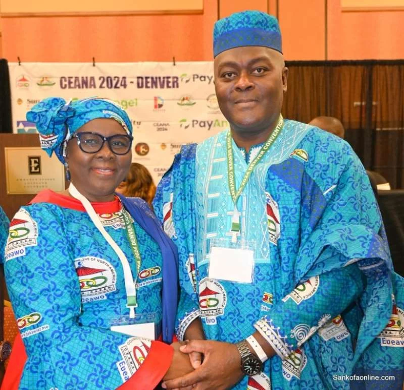 Two CEANA 2024 delegates in coordinated blue convention attire