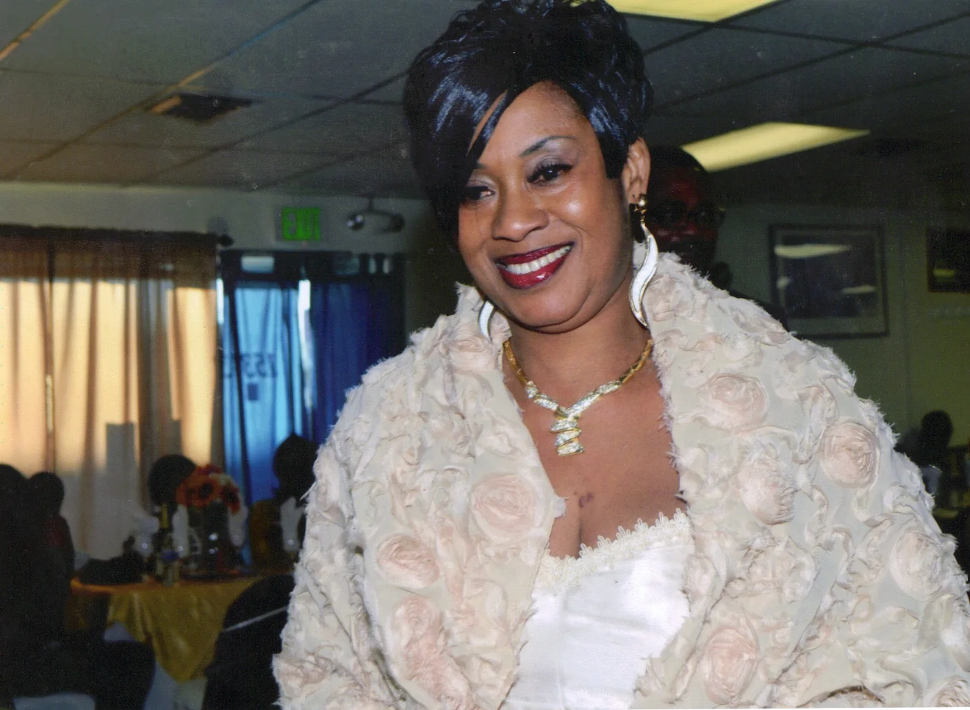 Smiling association member dressed for a celebration