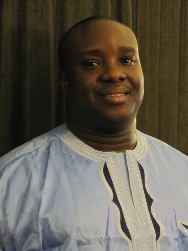 Portrait of an Ewe Association member in traditional attire