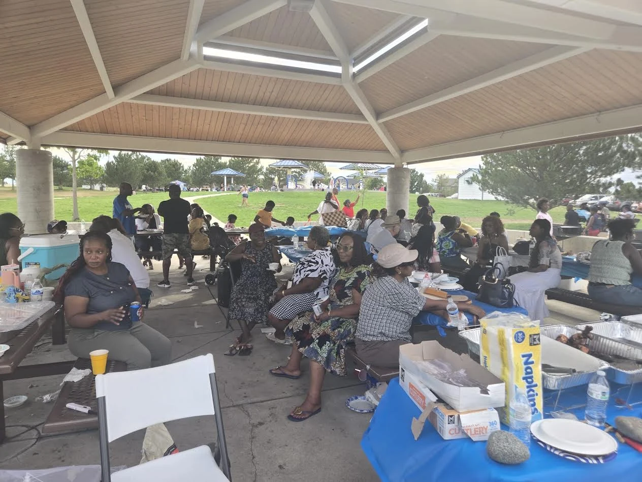 Ewe Association of Colorado members gathering beneath a park pavilion